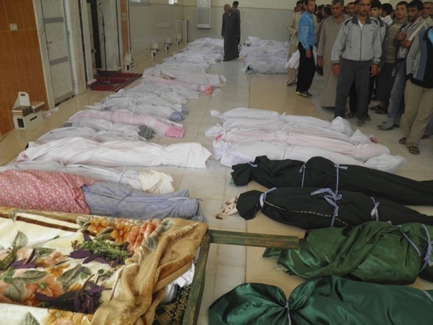 Corpos de vtimas dos ataques nas ltimas 24 horas so vistos em Hula